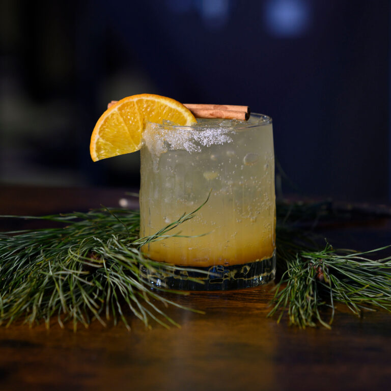 Little Brown Jug's Frosted Orchard mocktail featuring cinnamon and orange