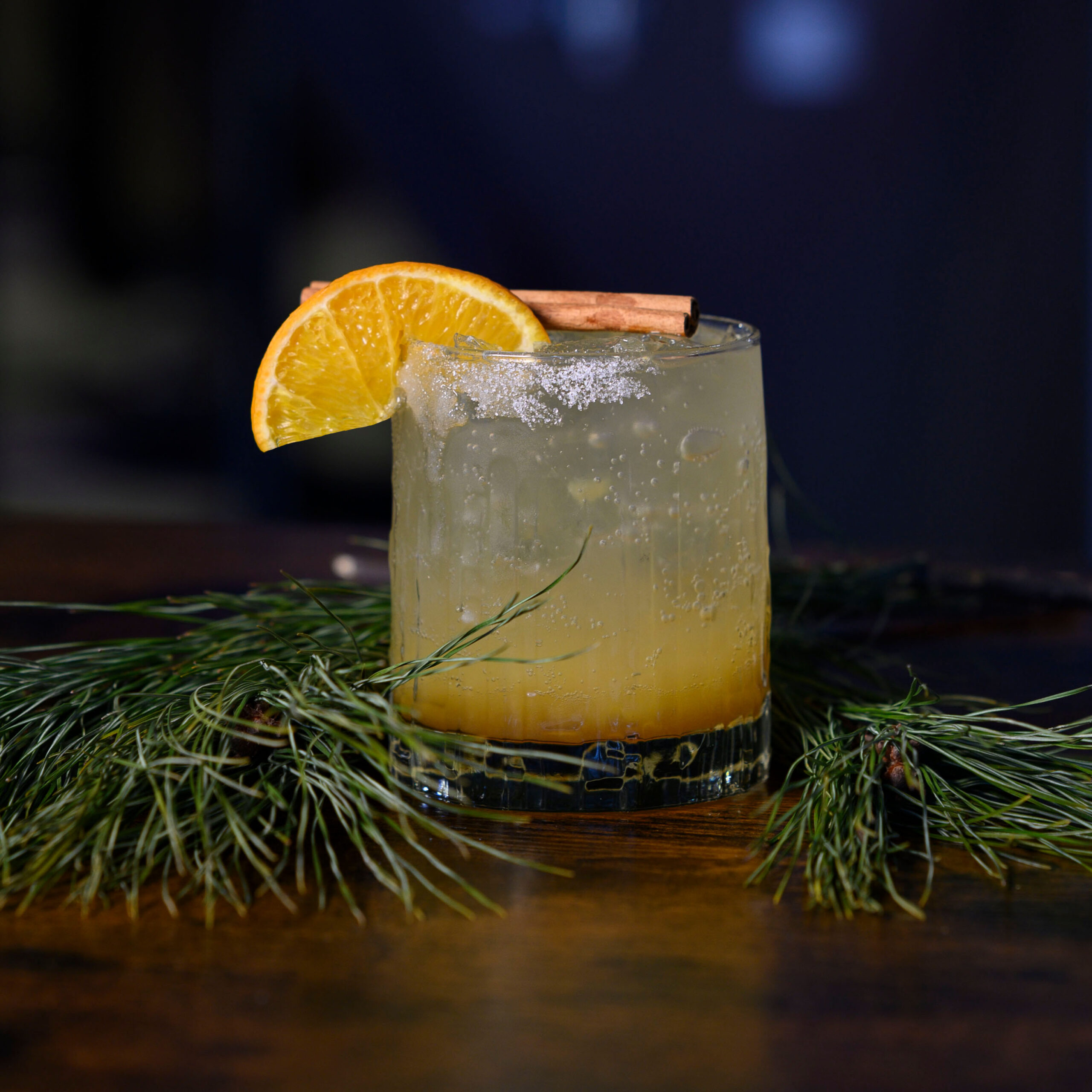 Little Brown Jug's Frosted Orchard mocktail featuring cinnamon and orange