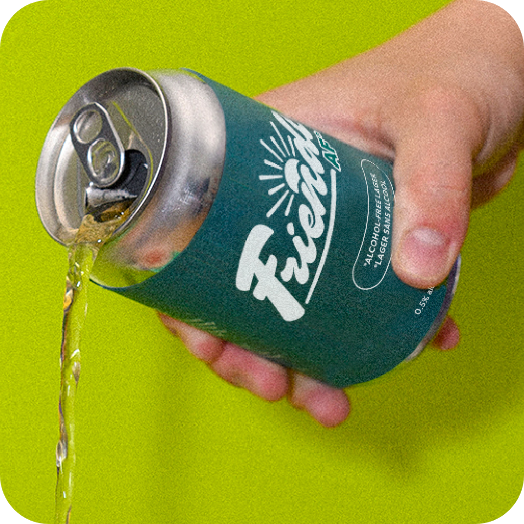 Hand pouring out a friendly af against a green background.